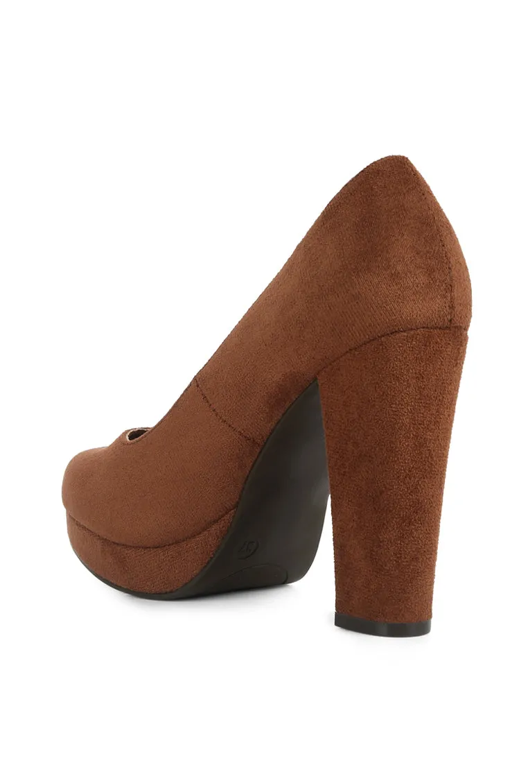 delia seude block heel pumps